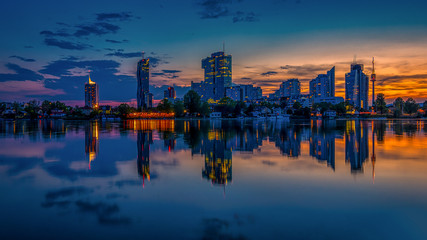Panoramic cityscape image of Vienna capital city of Austria during sunset.