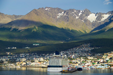 Panoramic and scenic view of Ushuaia port in Patagonia on summer day with cruiseship Celebrity...