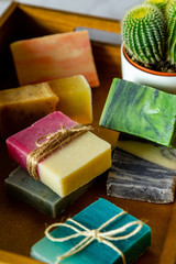 Spa box with organic handmade soap bars with white marble background.