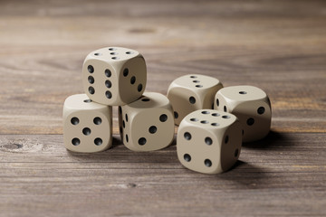 Dices on wood surface. 3d rendering - illustration.