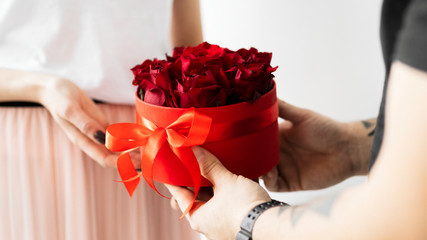 Couple with a box of roses background