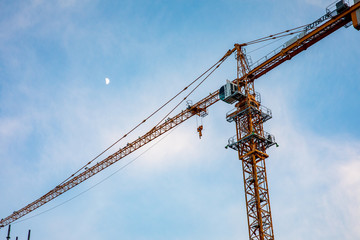 construction crane against blue sky