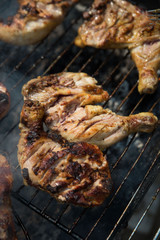 grilled meat on the grill isolated. chicken drumstick barbecue