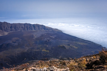 Cha das Caldeiras over the clouds view from Pico do Fogo in Cape Verde