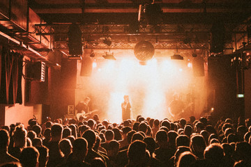 Rock band playing a concert at a live house in Europe