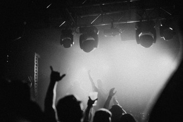 Rock band playing a concert at a live house in Europe