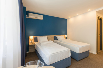 Fototapeta na wymiar Interior of a separate double bed hotel room interior