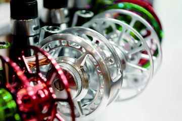 A variety of fishing reels. Fishing gear and accessories.