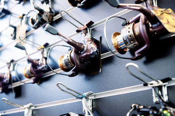 A variety of fishing reels. Fishing gear and accessories.