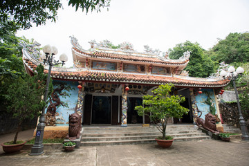 Naklejka premium Danang, Vietnam - December 8 2019 : Buddhist temple at Marble mountains in Danang, Central Vietnam.