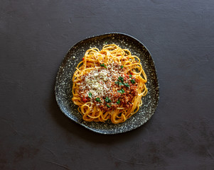 Italian pasta bolognese. Spaghetti. National cuisine. Recipe. Rustic.