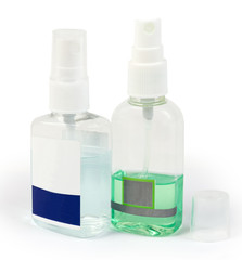 Plastic bottles of antiseptics on a white background
