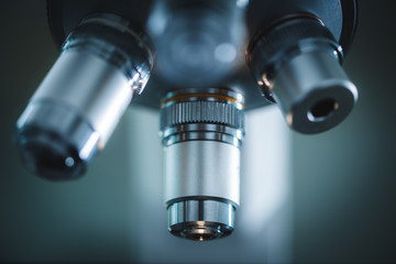 microscope close-up in laboratory, science research concept