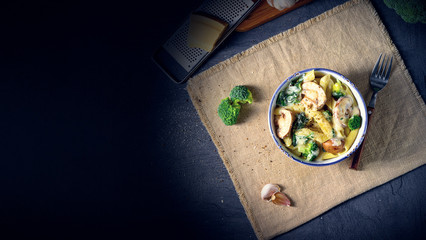 Real pasta with mushrooms, spinach and broccoli