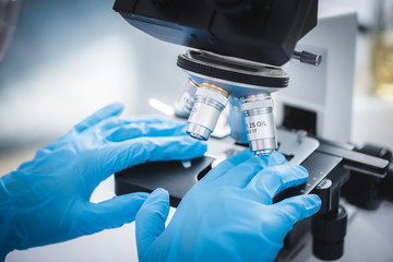 microscope close-up in laboratory, science research concept