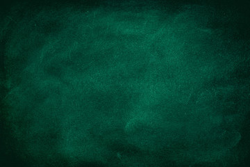 Green Chalkboard. Chalk texture school board display for background. chalk traces erased with copy space for add text or graphic design. Backdrop of Education concepts 