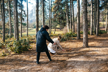 Scientists are studying plant species in the forest.