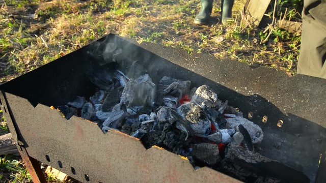 Man made barbecue of salmon outdoors.