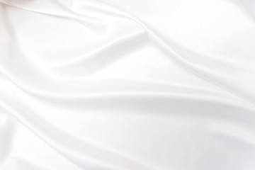 Naklejka na ściany i meble Smooth elegant white silk or satin texture. Luxurious backdrop design