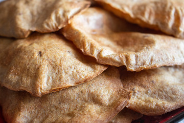 Fresh baked rye bread. Sliced homemade bread. Rye tortillas and pita bread. Organic healthy food. Rye toasts close up. Diet nutrition. Homemade fresh bakery. 