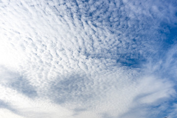 BLUE SKY WITH CLOUDS IN SPRING