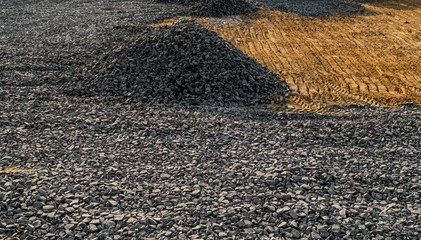Gravel and sand piles on construction site. Materials for building.