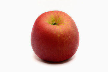 Red ripe apple on white background.