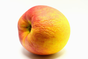 Red ripe apple on white background.