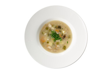 Russian vegetable soup rassolnik with pickled cucumber isolated on white background