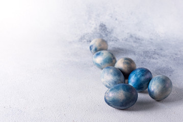 Colored eggs. big bright blue chicken eggs on a beautiful background