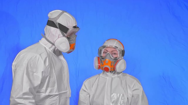 Doctor health worker in respirator. Slow motion. People portrait, wearing protect medical antibacterial antiviral aerosol spray paint mask. Concept health safety virus protection coronavirus epidemic.
