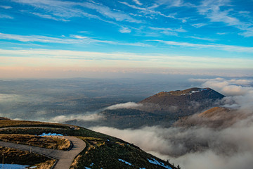 Naklejka premium Sunset on a sea of clouds