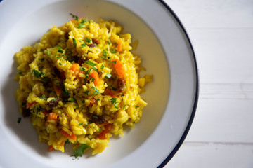 Yellow curry rice with vegetables and raisins