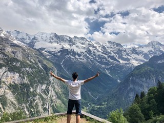 Naklejka premium Man on the top of the mountain