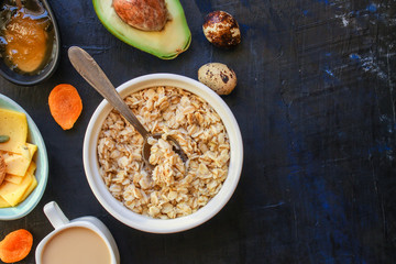 breakfast (oatmeal porridge, dairy products and more, snack) menu concept background. top view. copy space for text