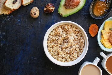 breakfast (oatmeal porridge, dairy products and more, snack) menu concept background. top view. copy space for text