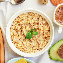 breakfast (oatmeal porridge, dairy products and more, snack) menu concept background. top view. copy space for text