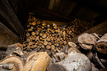 Stock of firewood, storage with firewood for heating
