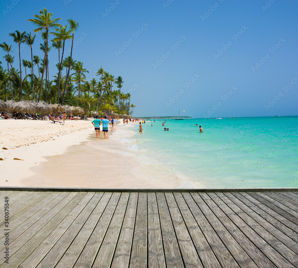 Canvas Prints Empty wooden platform beside tropical beach at Punta Cana, Dominican Republic