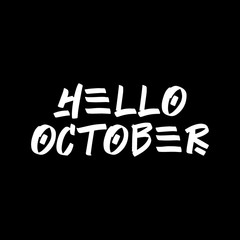 Fototapeta na wymiar Hello October brush paint hand drawn lettering on black background. Design templates for greeting cards, overlays, posters