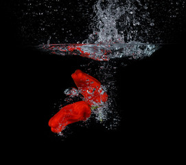 Pepper falling into the water