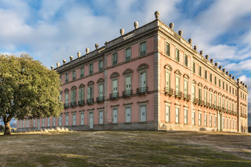 Fototapeta na wymiar Exterior facade of the Royal Palace of Riofrío is one of the residences of the Spanish Royal Family. It is surrounded by an extensive forest of 625 hectares, inhabited by deer and deer, among others,