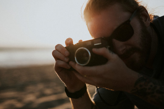 Male travel photographer in California
