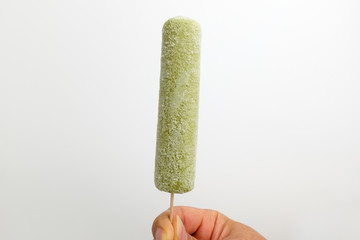 Green tea ice cream on white background