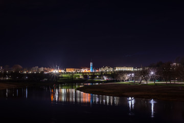 Fototapeta na wymiar Amazing view of the night city of Mogilev across the Dnieper River. Belarus