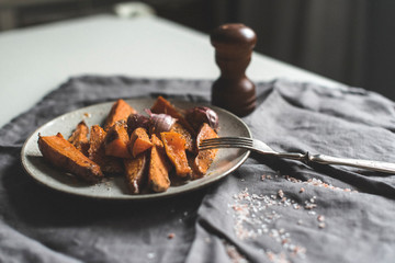  Baked yam with garlic on the plate