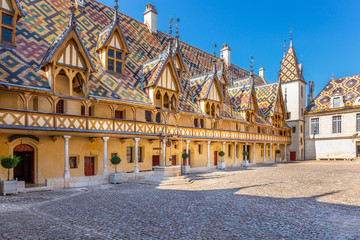 19 September 2019. Courtyard of Hotel Dieu or Hospice de Beaune, in Burgundy region, France.. - obrazy, fototapety, plakaty