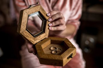 wedding rings in a casket