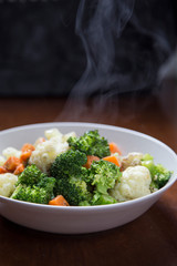 Dish with boiled vegetables.