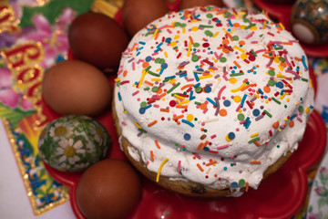 Fototapeta na wymiar Easter cakes, Easter cake, cake with raisins and colored glaze